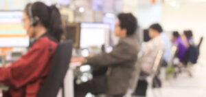 A blurry picture of people at an airport.